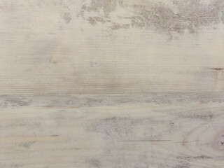 An old gray wooden wall with a horizontal pattern. Vintage grey background with wooden texture.
