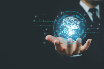 Brain inside the hands of the businessman. Artificial Intelligence concept, Technology, concept.