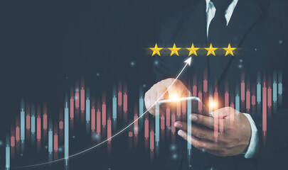 Business, Technology, business financial investment data graph and chart business growth. Businessman using the smart phone with financial graph on background.