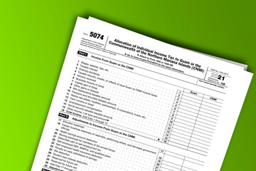Obraz premium Form 5074 documentation published IRS USA 10.14.2021. American tax document on colored