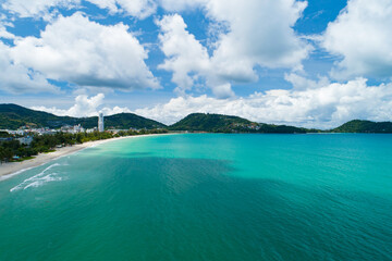 Aerial view of blue sea surface water texture background Drone flying over sea Waves water surface texture on sunny tropical ocean in Phuket island Thailand.Travel and tour background