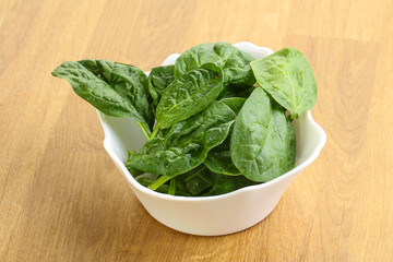 Fresh green spinach leaves in the bowl