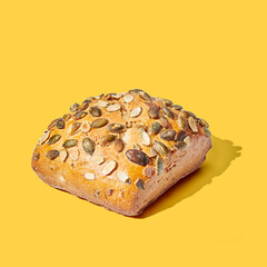 bun on a yellow background