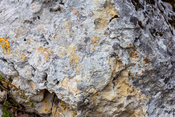 "Natural natural stone,textured section, stone tunnel, inert material used for construction and decorative finishing, close-up.