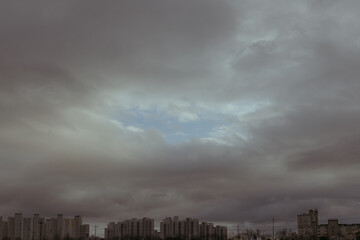 time lapse of clouds over city