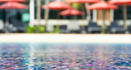 Abstract blur outdoor swimming pool at hotel for background. copy spec for text