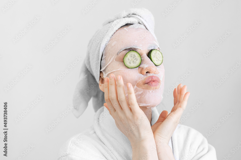 Sticker young woman with sheet mask on her face, spa procedure.