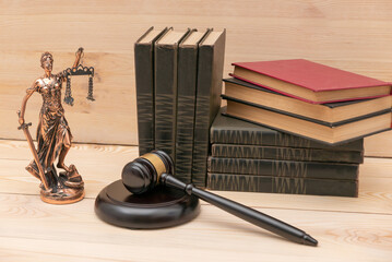 Lady Justice. Law symbols in bokeh background.