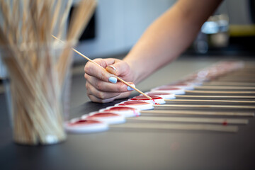 Close-up, the process of making lollipops from natural ingredients.