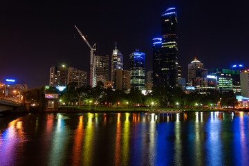 Obraz na płótnie Canvas Melbourne city night-cap with lights reflecting in the Yarra river