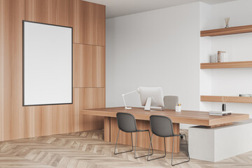 Corner view on bright office interior with empty white poster