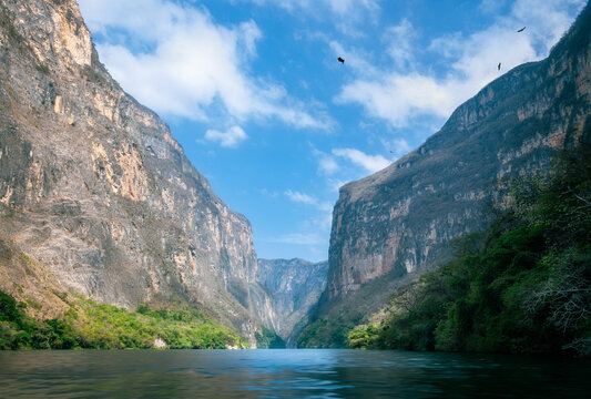 The Sump Canyon is the most spectacular part of the Sumidero Canyon where the waters of Grijalva River are deepest and the canyon walls reach up to 1,000 meters high -located in Chiapas -South Mexico.