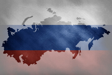 The outline of Russia in the national colors on a grunge background