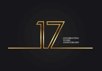 17 Years Anniversary logotype with golden colored font numbers made of one connected line, isolated on black background for company celebration event, birthday