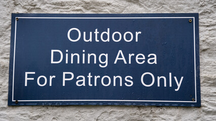 Blue Outdoor Dining Area for Patrons Only Wall Sign