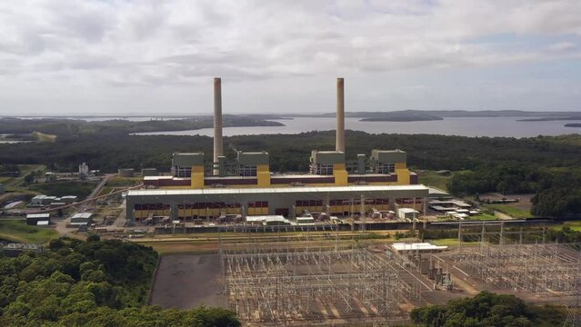 Workshops and buildings of Eraring power plant on termal coal as aerial 4k.
