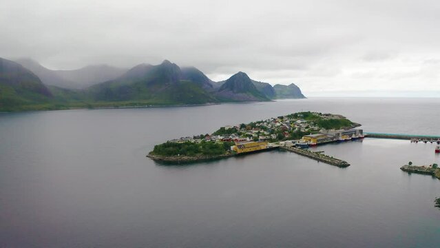 Flying around the Husoy fishing village on the Senja Island, Norway