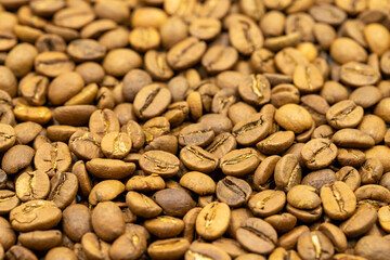 Coffee beans background. Close up of roasted coffee beans