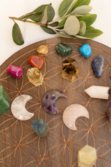 Healing crystals on brown background