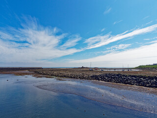 The Old Inner Seahouses Harbour separated from the main Harbour channel by Rocks and Mudbanks, with Yachts and Pleasure Craft moored in the basin