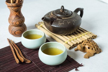 Tea set, on a wooden table made of bamboo