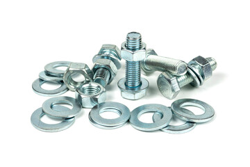 Several silver metal mounting bolts with nuts and washers on a white background. Close-up
