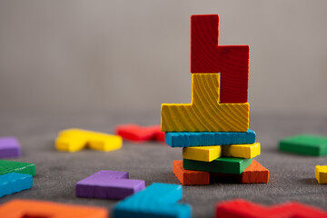 Creative idea solution - business concept, jigsaw puzzle on the grey background. Leadership and...
