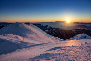 view of Chleb in Mala Fatra on snowy slopes during sunrise