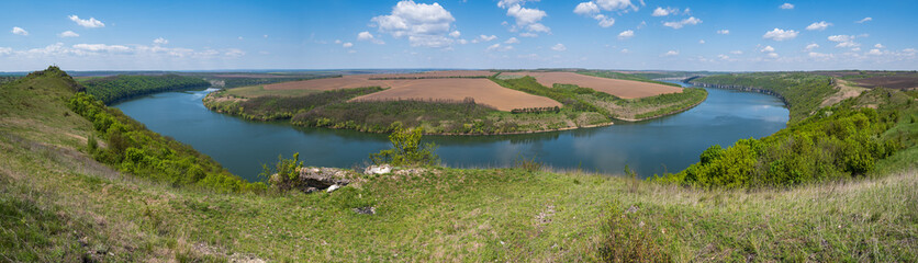 Amazing spring view on the Dnister River Canyon with picturesque rocks, fields, flowers. This place named Shyshkovi Gorby,  Nahoriany, Chernivtsi region, Ukraine.