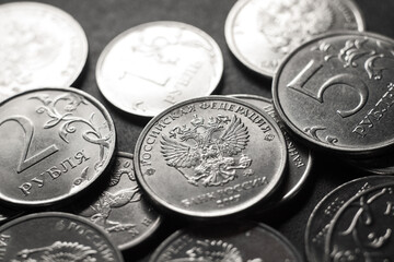 Russian rubles close-up on black background. Financial sanctions against Russia. The collapse of...