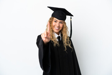 Young university graduate isolated on white background showing and lifting a finger