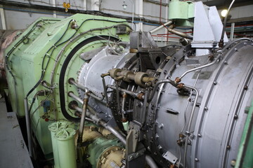 Gas transportation system. Booster pumping station for gas. Gas filling station and gas tanks. Transportation of gas around the world. Oil and gas sector. Gas turbines.