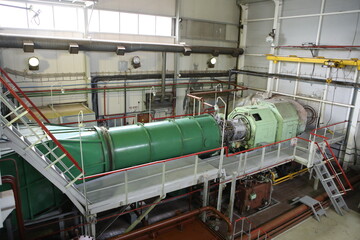 Gas transportation system. Booster pumping station for gas. Gas filling station and gas tanks. Transportation of gas around the world. Oil and gas sector. Gas turbines.