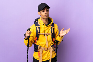 African American man with backpack and trekking poles over isolated background making doubts gesture