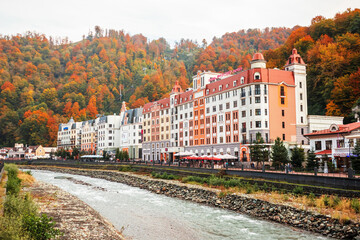 Obraz premium Colorful houses on the embankment in the Rosa Khutor resort.