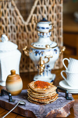 Banner. Delicious pancakes with red caviar. Russian and Ukrainian cuisine. The concept of the...
