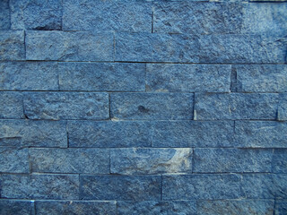 Blue stone bricks wall texture.