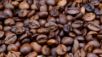 Fragrant roasted dark coffee beans medium roasted coffee beans. Top view. - 493775294