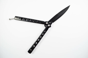 Matte Black Butterfly Knife On The White Backround