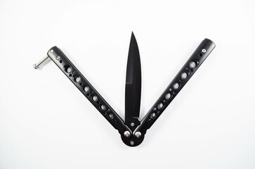 Matte Black Butterfly Knife On The White Backround