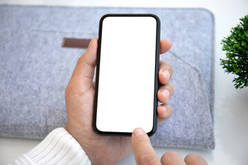 male hands hold phone with isolated screen background in office