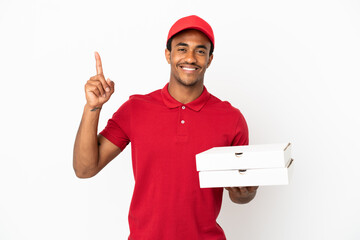 African American pizza delivery man picking up pizza boxes over isolated white wall pointing up a great idea