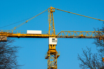 Yellow construction tower crane