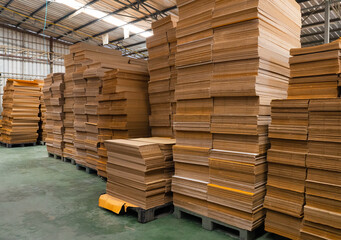 Stack of Corrugated Paper Preparing For Packaging in Factory