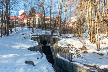 Sewer collector opening into the forest park area