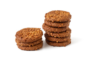 Fototapeta na wymiar Two stacks of round oatmeal cookies with peanuts