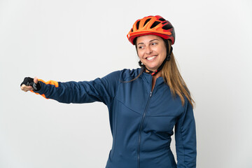 Middle age cyclist woman isolated on white background giving a thumbs up gesture