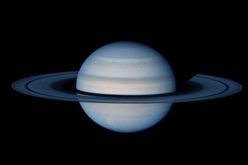 Saturn with rings, on a dark background. Elements of this image furnished by NASA - obrazy, fototapety, plakaty
