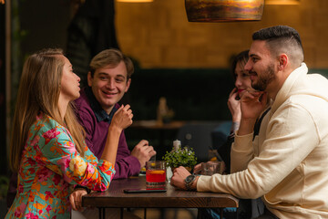 Having a discussion in the bar while having fun