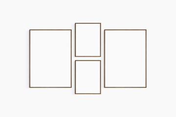 Gallery wall mockup. Set of 4 walnut wood frames. Gallery wall frame mockup. Two 50x70 (5:7) and two 30x40 (3:4) wooden frames.